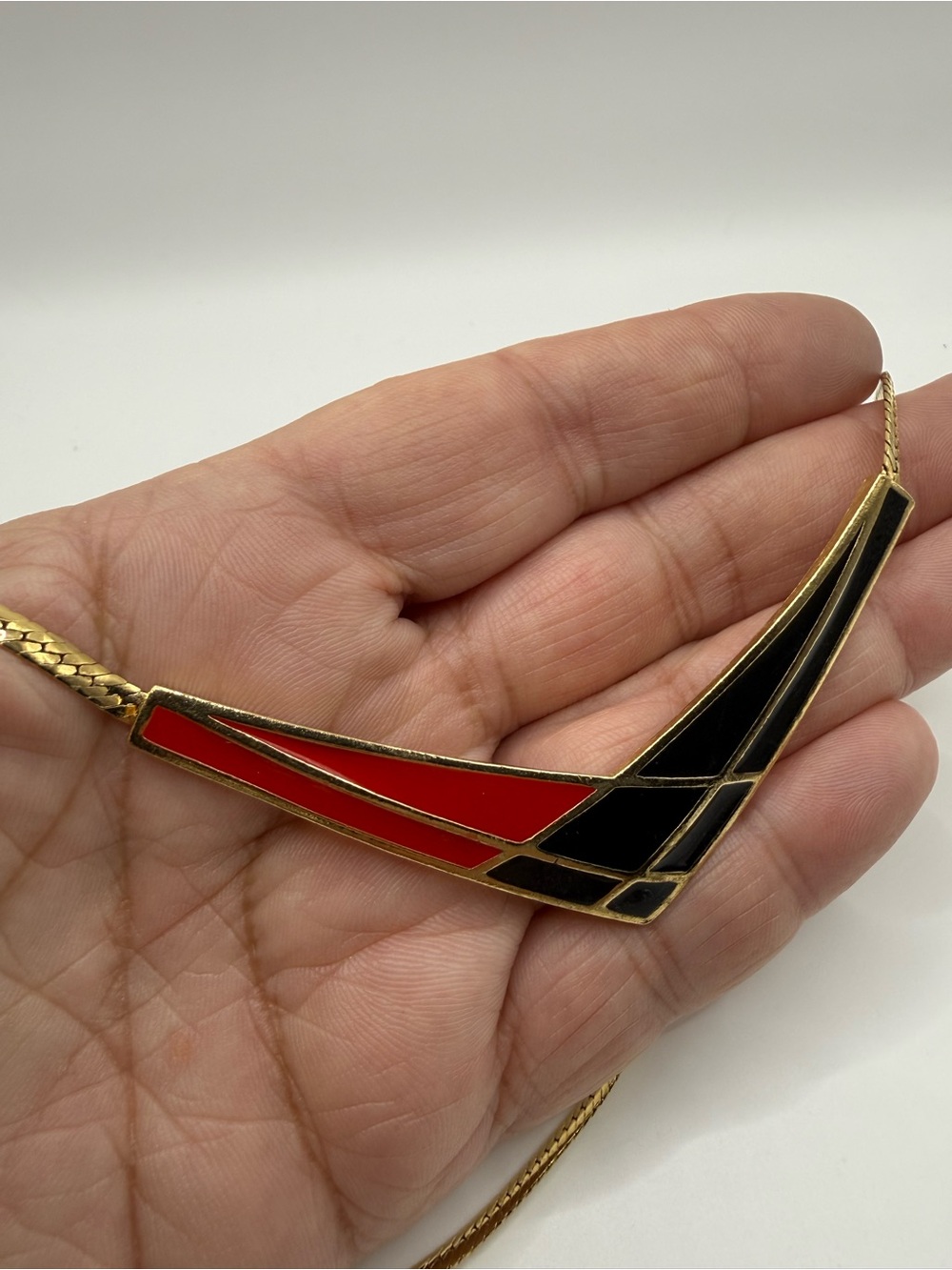 Vintage Avon Color Splash necklace from 1986 geometric red-and-black enamel bib